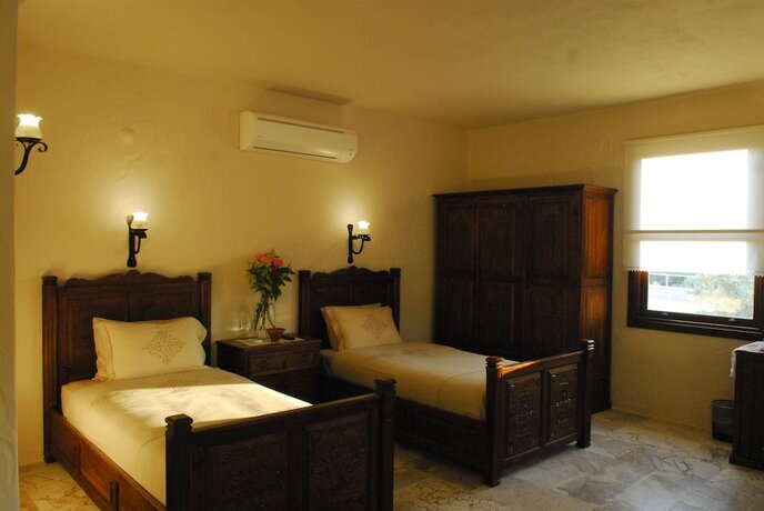 Imagen de la habitación del Hotel Mandarin and Mango Boutique. Foto 34