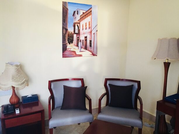 Imagen de la habitación del Hotel Mandhari Villa. Foto 17