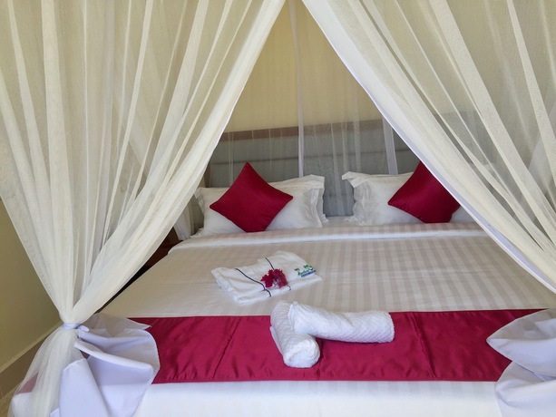 Imagen de la habitación del Hotel Mandhari Villa. Foto 18
