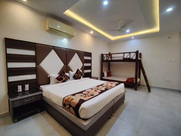 Imagen de la habitación del Hotel Mandi Heights. Foto 13