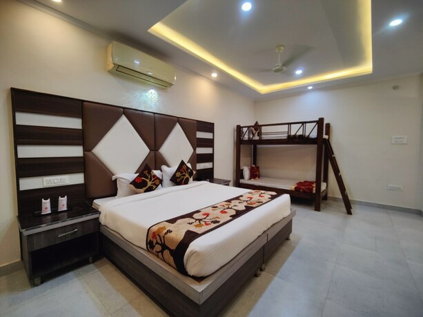 Imagen de la habitación del Hotel Mandi Heights. Foto 18