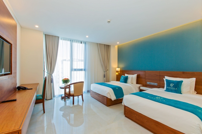 Imagen de la habitación del Hotel Mandila Beach Danang. Foto 15