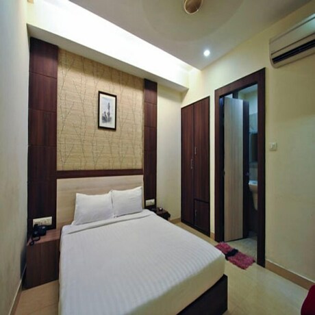 Imagen de la habitación del Hotel Mandiram. Foto 23