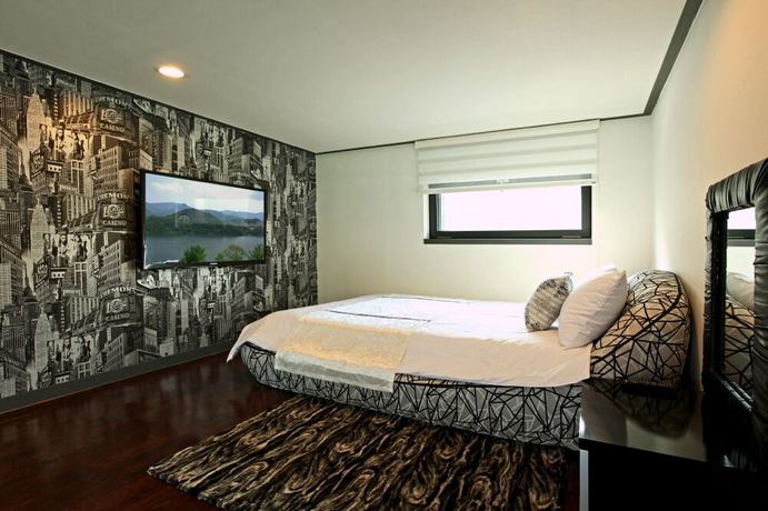 Imagen de la habitación del Hotel Mandm Pension. Foto 16