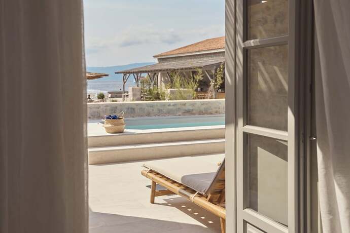 Imagen de la habitación del Hotel Mandraki Beach Resort - Adults Only. Foto 19