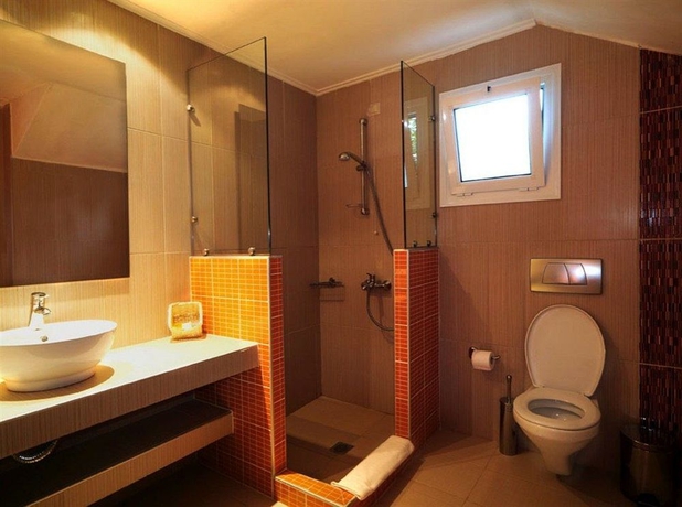Imagen de la habitación del Hotel Mandraki Village Boutique. Foto 3