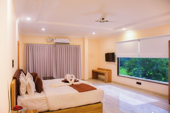 Imagen de la habitación del Hotel Mandu\'s Green Valley Resort. Foto 5