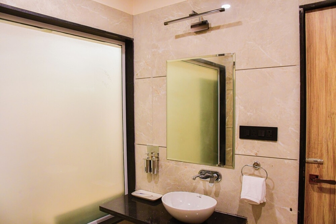 Imagen de la habitación del Hotel Mandu\'s Green Valley Resort. Foto 11