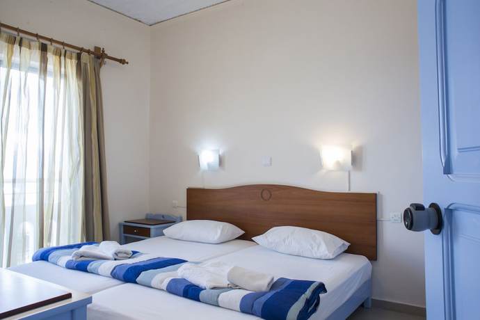 Imagen de la habitación del Hotel Mandy Suites. Foto 16