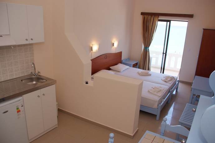 Imagen de la habitación del Hotel Mandy Suites. Foto 17