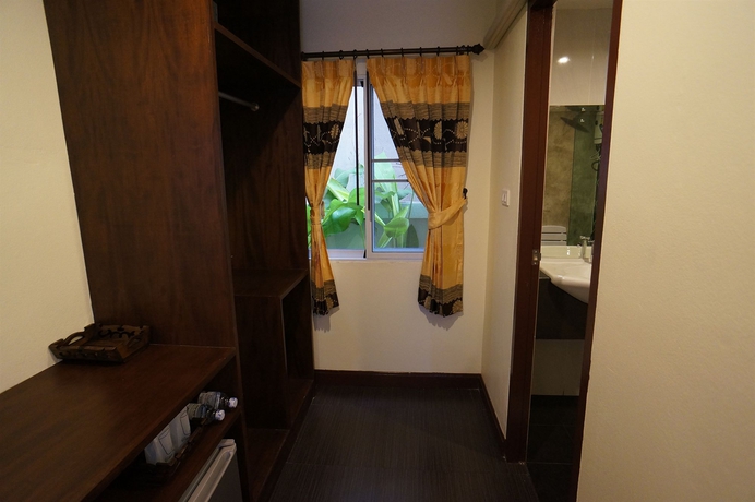 Imagen de la habitación del Hotel Manee At Cool Mueang. Foto 13