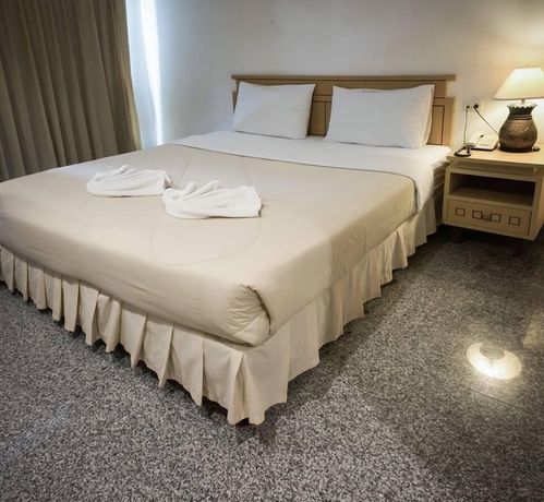Imagen de la habitación del Hotel Maneerote Surin. Foto 3