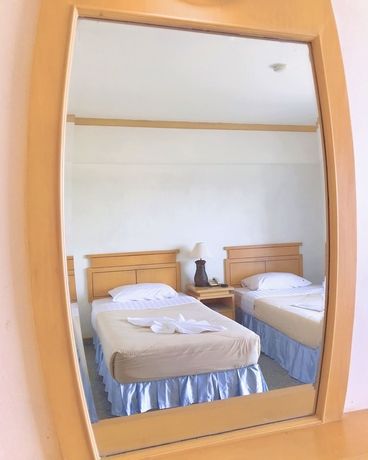 Imagen de la habitación del Hotel Maneerote Surin. Foto 7