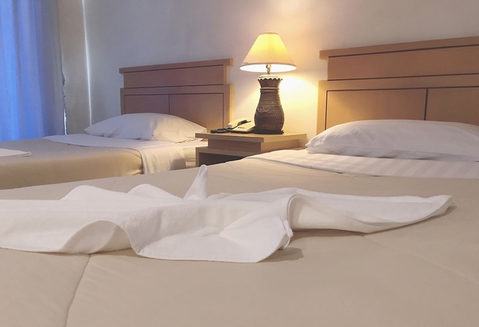 Imagen de la habitación del Hotel Maneerote Surin. Foto 12