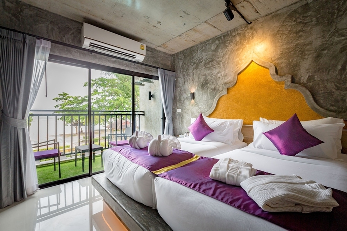 Imagen de la habitación del Hotel Maneetel Krabi Beachfront. Foto 4