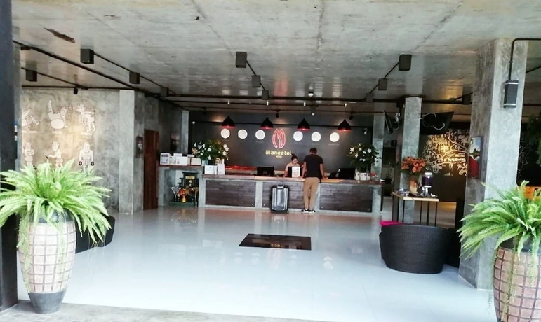 Imagen de los interiores del Hotel Maneetel Krabi Beachfront. Foto 11
