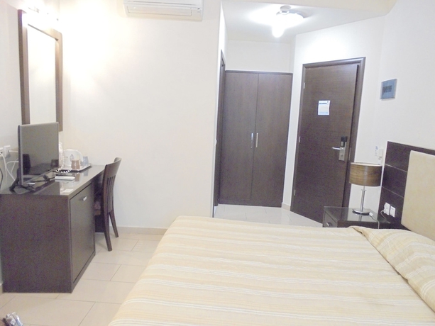 Imagen de la habitación del Hotel Manessi City. Foto 11