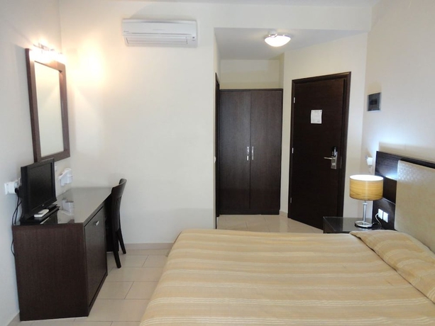 Imagen de la habitación del Hotel Manessi City. Foto 12