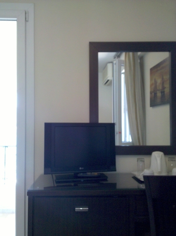 Imagen de la habitación del Hotel Manessi City. Foto 15