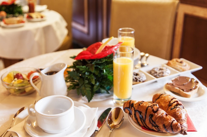 Imagen del bar/restaurante del Hotel Manfredi Suite In Rome. Foto 4