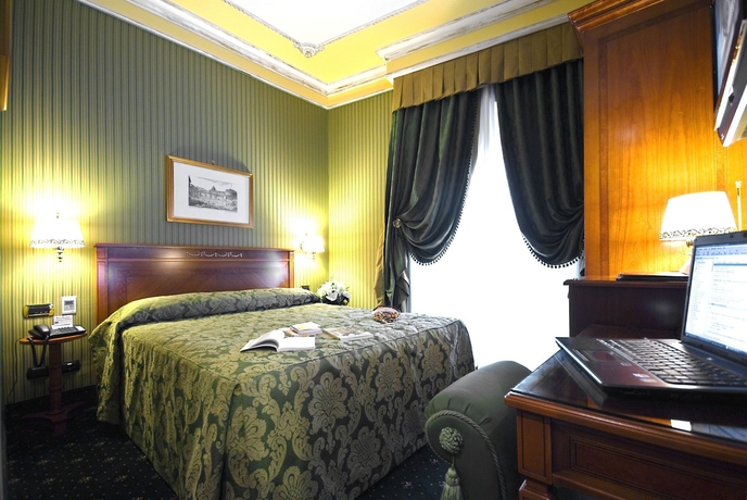 Imagen de la habitación del Hotel Manfredi Suite In Rome. Foto 11