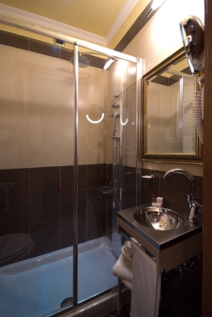 Imagen de la habitación del Hotel Manfredi Suite In Rome. Foto 12