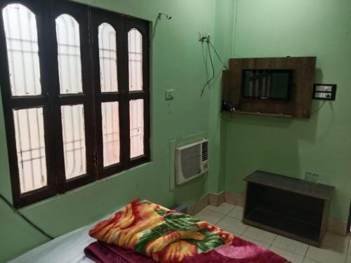 Imagen general del Hotel Mangalam Guest House. Foto 12