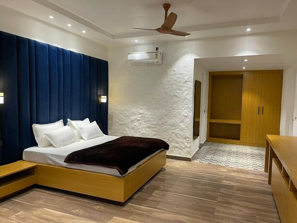 Imagen de la habitación del Hotel Mangalam Inn By Aaa Grand. Foto 11