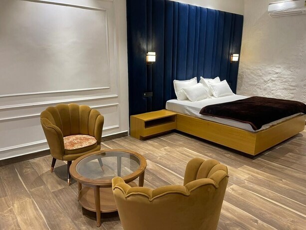 Imagen de la habitación del Hotel Mangalam Inn By Aaa Grand. Foto 12