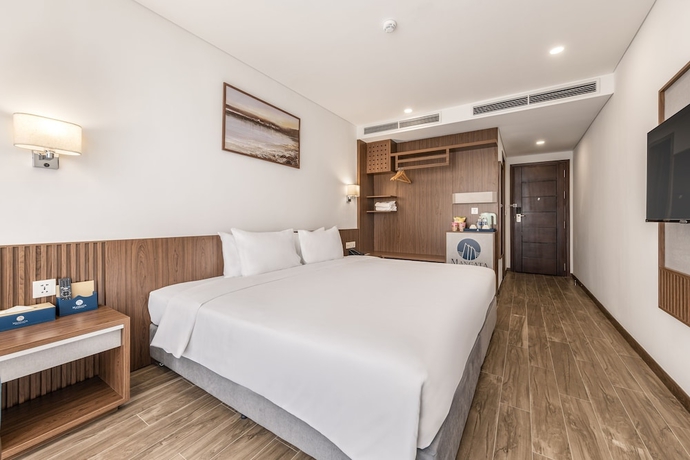 Imagen de la habitación del Hotel Mangata Beachfront. Foto 3