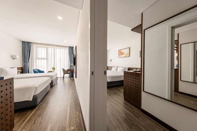 Imagen de la habitación del Hotel Mangata Beachfront. Foto 10