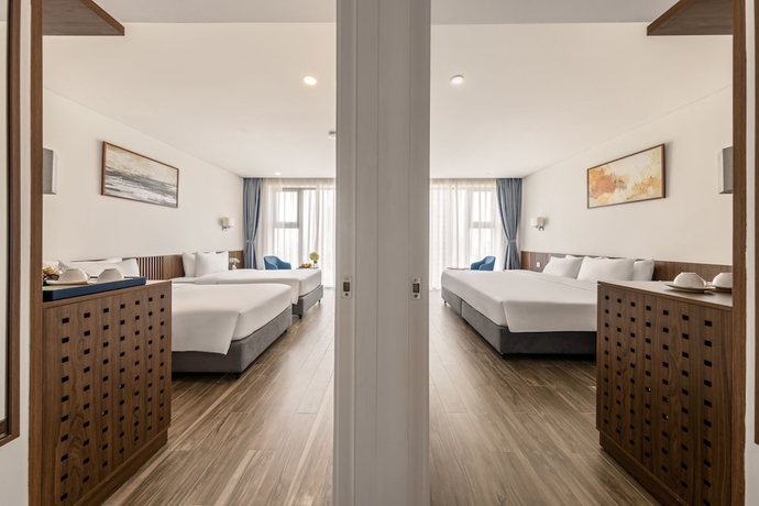 Imagen de la habitación del Hotel Mangata Beachfront. Foto 11