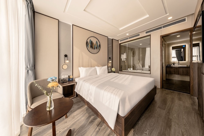 Imagen de la habitación del Hotel Mangata Beachfront. Foto 12