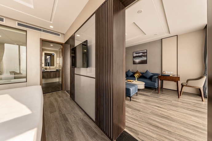 Imagen de la habitación del Hotel Mangata Beachfront. Foto 14