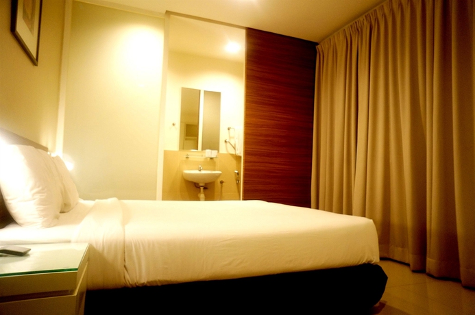 Imagen de la habitación del Hotel Mangga Boutique. Foto 8