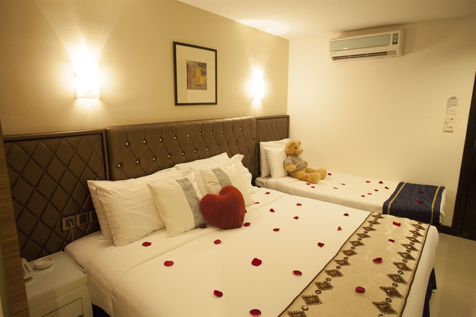 Imagen de la habitación del Hotel Mangga Boutique. Foto 9