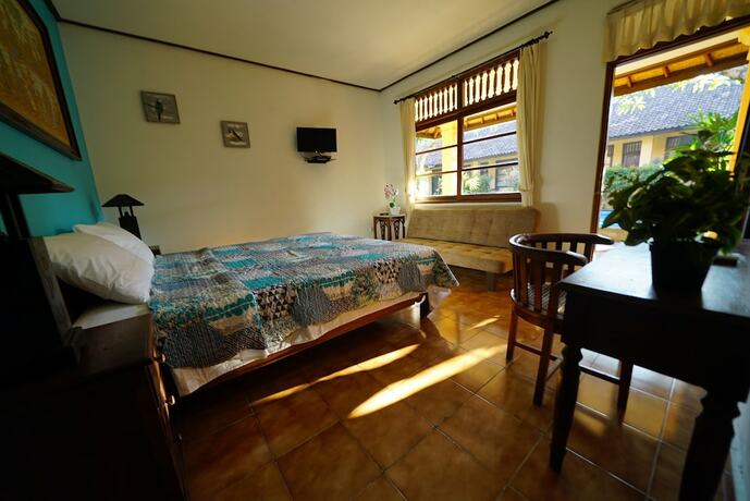 Imagen general del Hotel Mangga Bungalow. Foto 12