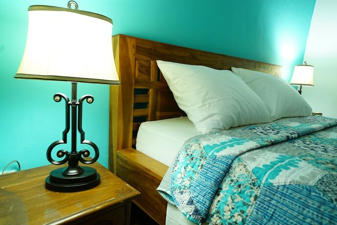 Imagen de la habitación del Hotel Mangga Bungalow. Foto 18