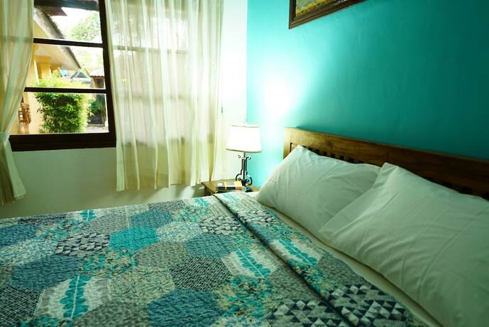 Imagen de la habitación del Hotel Mangga Bungalow. Foto 22