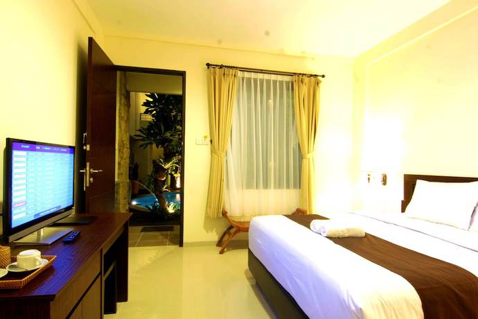 Imagen de la habitación del Hotel Manggar Indonesia and Residence. Foto 8