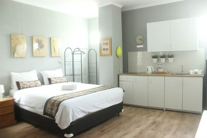 Imagen de la habitación del Hotel Manggolo Homestay Syariah. Foto 14