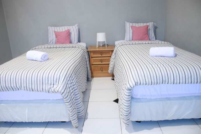 Imagen de la habitación del Hotel Manggolo Homestay Syariah. Foto 16