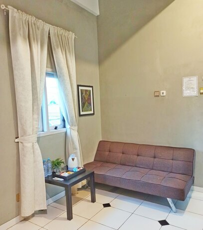Imagen de la habitación del Hotel Manggolo Homestay Syariah. Foto 17