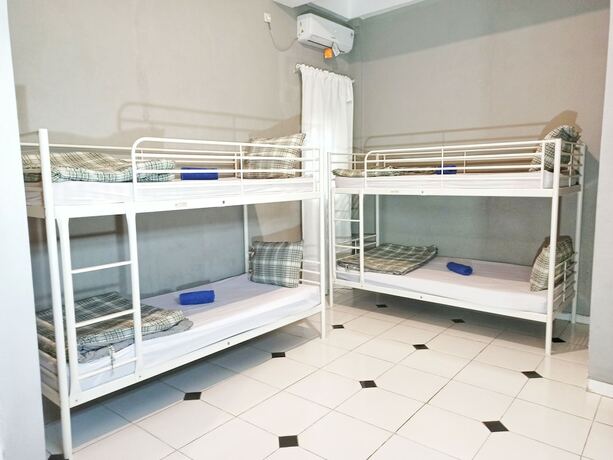 Imagen de la habitación del Hotel Manggolo Homestay Syariah. Foto 18