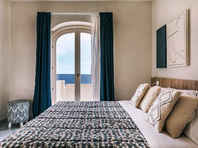 Imagen de la habitación del Hotel Mangia's Favignana Resort. Foto 4