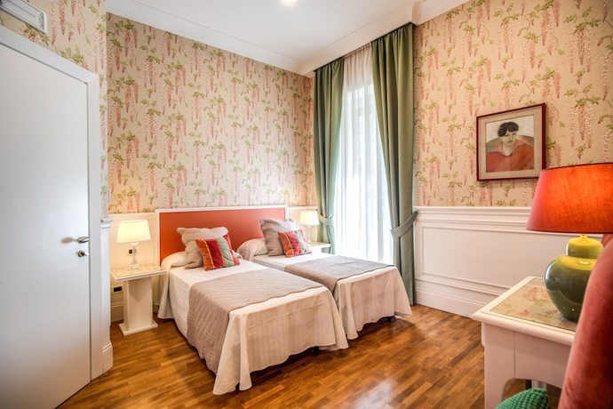 Imagen de la habitación del Hotel Mangili Garden. Foto 6
