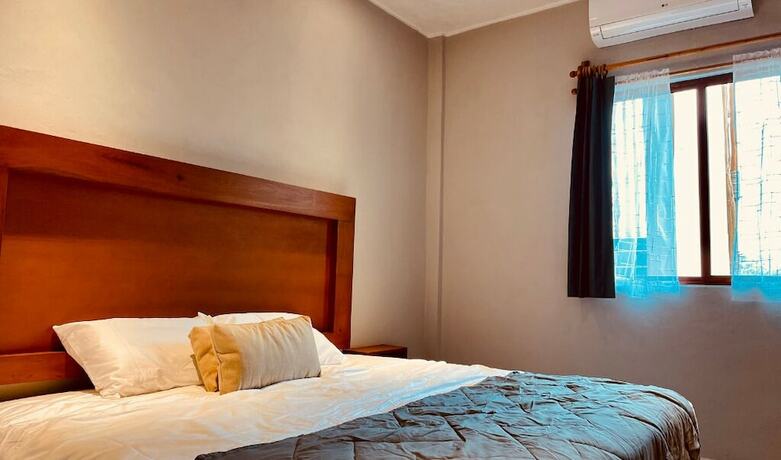 Imagen de la habitación del Hotel Manglar Suites. Foto 19
