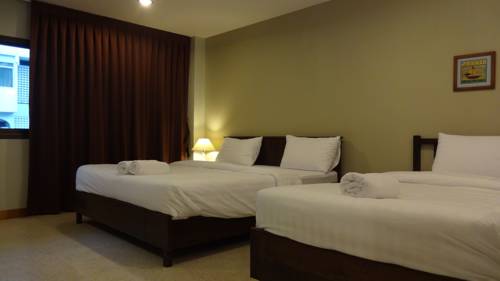 Imagen de la habitación del Hotel Mango Bedroom Inn. Foto 3