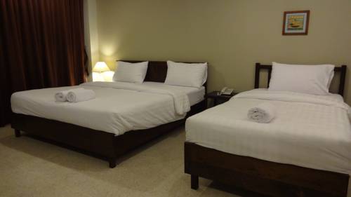 Imagen de la habitación del Hotel Mango Bedroom Inn. Foto 5