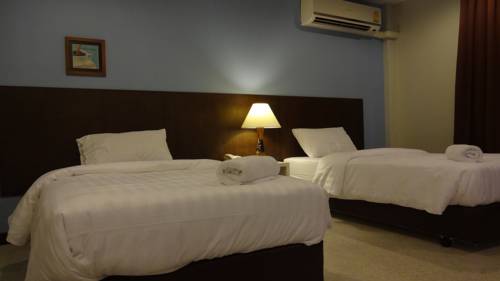 Imagen de la habitación del Hotel Mango Bedroom Inn. Foto 6